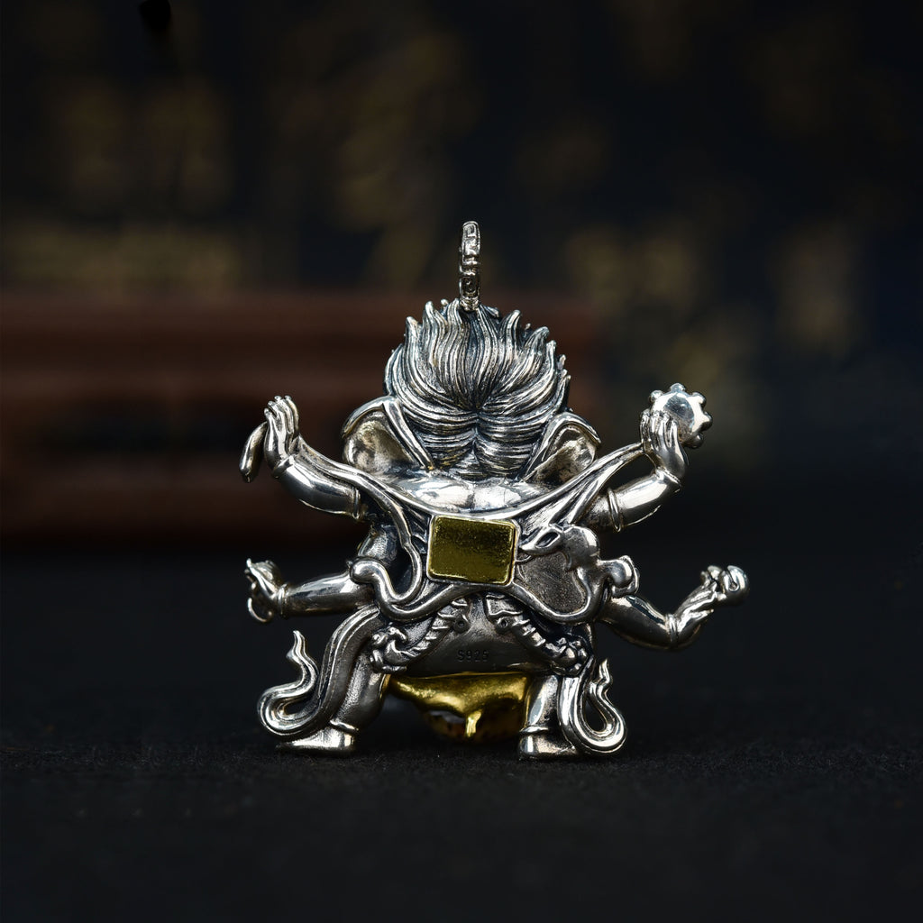 Six-Armed Mahakala Sterling Silver Pendant - Inlaid with Natural Red Agate