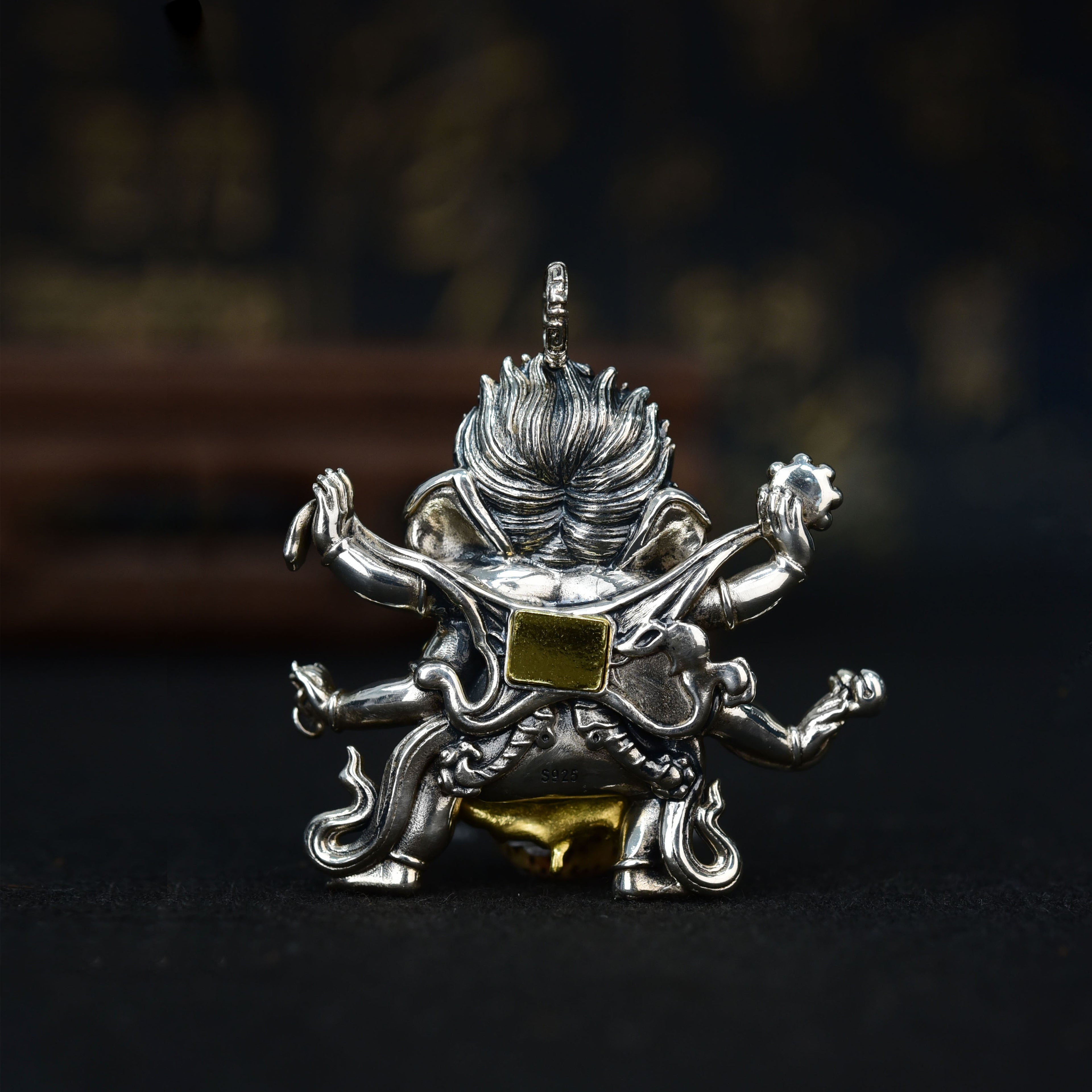 Six-Armed Mahakala Sterling Silver Pendant - Inlaid with Natural Red Agate