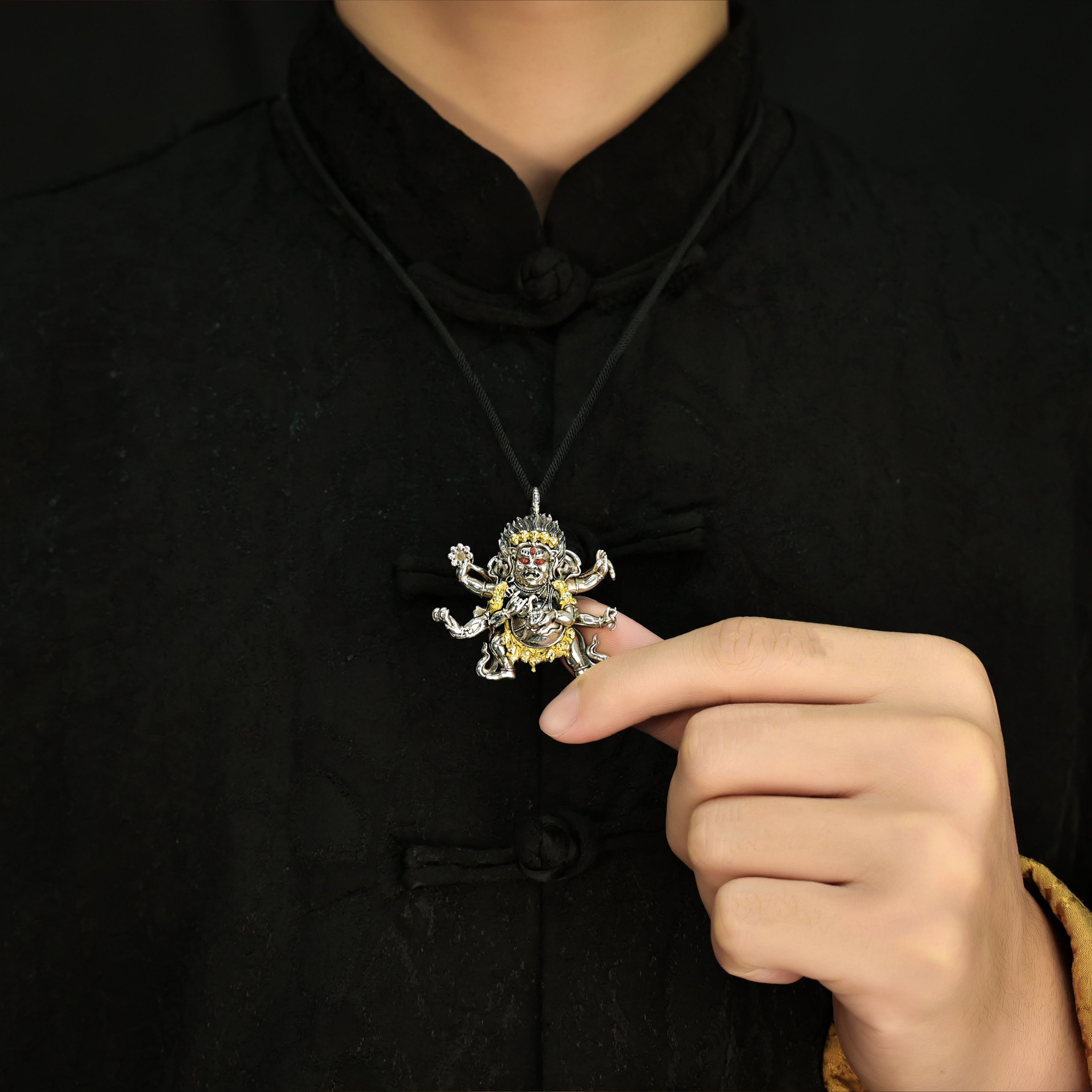 Six-Armed Mahakala Sterling Silver Pendant - Inlaid with Natural Red Agate