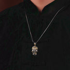 08#  Beacon of Ethical Wealth | Artisan-Crafted White Jambhala Pendant with Copper Detail